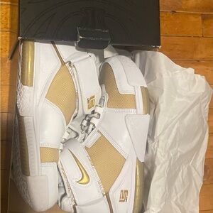 Nike White and Gold Basketball Sneakers there very good